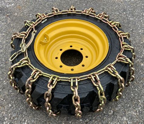 skid steer tire chains vs tracks|10x16.5 skid steer tire chains.